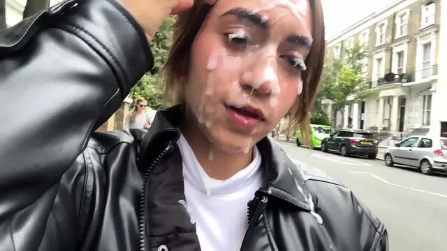Latina performer smiling after outdoor group scene