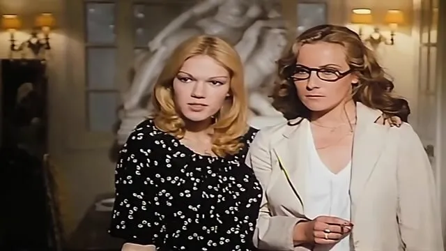 Brigitte Lahaie in retro lingerie with two partners